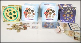 A group of three brilliant uncirculated coin collection one for 1998 and two for 2000 Millennium.