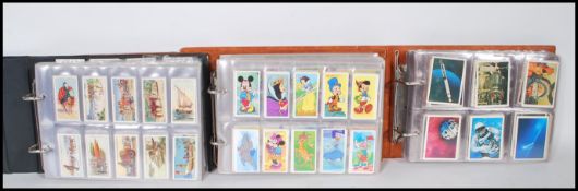 A collection of trade cards giveaways over three albums to include Transport issued by Bournville