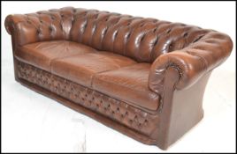 A good Victorian style chesterfield three seater sofa of good proportions, deep button back