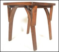 A 20th Century occasional / pub table by Stavecraft,flared square top raised on bentwood upright
