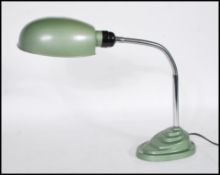 A retro mid 20th Century 1960's industrial desk / table lamp having articulated chrome gooseneck