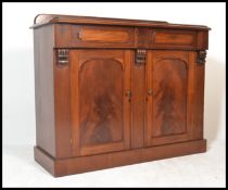 A late 19th / early 20th Century high Victorian flame mahogany chiffonier sideboard raised on plinth