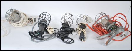A group of five vintage retro 20th Century industrial inspection lamps. Some lights having clamp