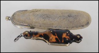 A pair of late 19th Century Victorian folding Lorgnettes glasses, housed within tortoiseshell inlaid