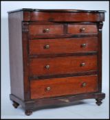 A 19th Century Victorian Apprentice piece mahogany Scottish chest of drawers. Raised turned bun feet
