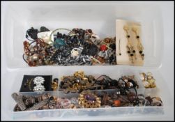 A collection of costume jewellery to include beaded necklaces two yellow Eva chain necklace and