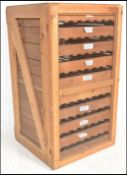 A vintage mid 20th Century wooden apple store, constructed using a simple framework of planks and
