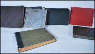 A collection of seven old photograph albums ranging in age from Queen Victoria to WWII. Images of