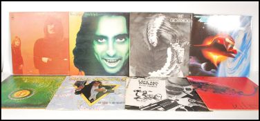A collection of vinyl long play LP record albums to include Alice Cooper Goes To Hell, Killer,