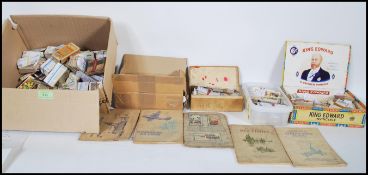 A collection of vintage cigarette cards and tea trade cards dating from the early 20th Century,