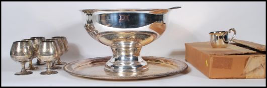 A contemporary silver plate punch set by Sheridan consisting of large punch bowl and twelve