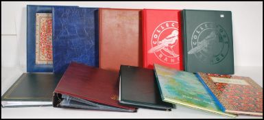 A collection of ten modern postcard / photo albums.