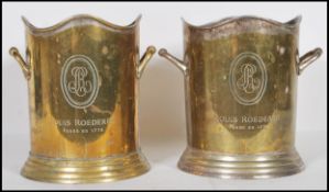 A good pair of early 20th century silver plated champagne ice buckets. Both marked to front '
