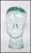 A vintage retro 20th Century milliners  advertising shop display glass phrenology type head of clear