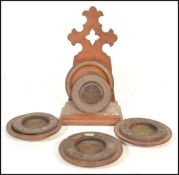 A collection of four 19th Century Victorian oak carved collection bowls with liners and a stand, the