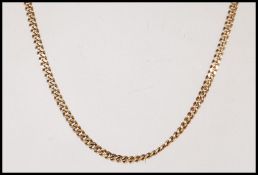 A stamped 375 9ct gold flat link necklace chain. Weight 18.1g. Measures 51cm long.