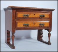 An early 20th Century apprentice piece style mahogany chest of drawers, flared gallery top with