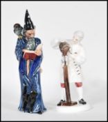 Two Royal Doulton bone China figurines to include The Wizard  HN 2877 and The Wig Maker of