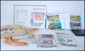 Stamps, postcards & few cigarette cards in box. Stockbook of GB (mostly u/m with definitives,