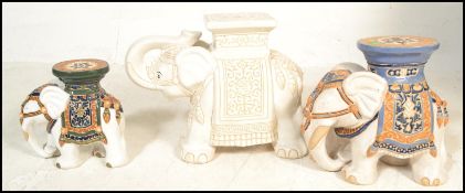 A 20th century Ceramic Plant Stand / stool in the form of an African / Indian Elephant together with