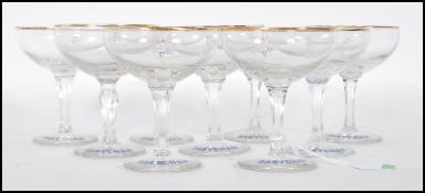 SET OF NINE 1950'S BABYCHAM ADVERTISING GLASSES
