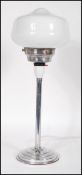 An early 20th Century Art Deco 1920's chrome table lamp with original brass flik switch to