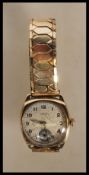 A vintage mid-century 1940's 9ct gold cased gent's wrist watch - J. W. Benson of London . The case