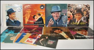 A collection of long play LP vinyl records and 7