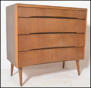 A retro mid-century teak wood ‘ beehive ‘ pedestal chest of drawers, likely by Avalon, having a bank