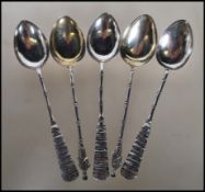 A set of five silver hallmarked Chinese silver teaspoons, each having Chinese characters