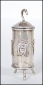 A Chinese silver travelling pepperette / spice pot of cylindrical form having raised characters to