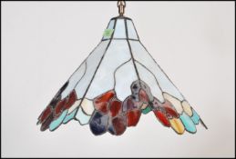 A vintage large 20th Century multi coloured leaded glass ceiling light fixture in the manner of
