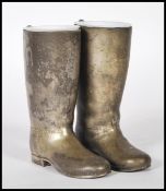 PAIR OF SILVER PLATED DRINKS MEASURES IN THE FORM OF BOOTS