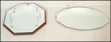 Two vintage retro mid 20th Century frameless wall mirrors to include an octagonal mirror with acid