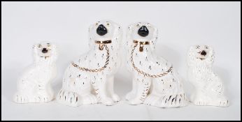 Two pairs of late 19th / early 20th century Victorian King Charles Spaniel ceramic Staffordshire