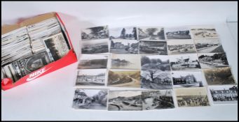 A Collection of black & white real photographic postcards. All British standard small size views.