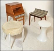 A collection of retro 20th Century stools to include a Tam Tam stool, Danish dressing table stool,