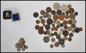 A small group of pre decimal and later coins, mostly British dating from the 19th Century