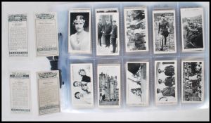 A collection of vintage 20th Century cigarette trade cards and giveaway collectors cards to