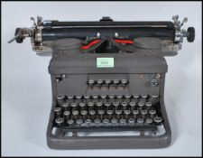 A Vintage early 20th Century Circa 1930s industrial Typewriter machine by 