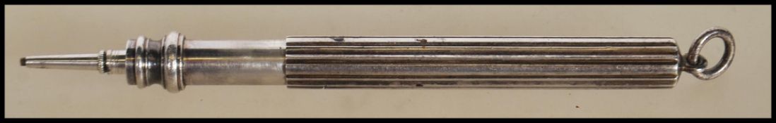 A mid 20th Century B Mordan & Co Sterling silver propelling metamorphic retracting pencil having a