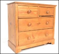 A 19th Century Victorian two over two scrubbed pine cottage chest of drawers, flared top over a
