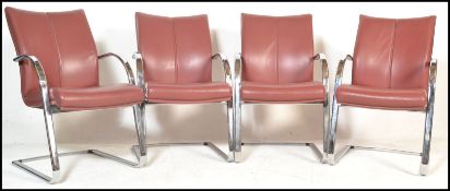 A set of four retro 20th Century leather cantileve