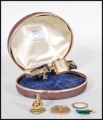 A collection of vintage and antique jewellery to include an Aviva cocktail watch with a square