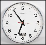 A vintage retro 20th Century industrial factory school Seiko Transistor 5 jewel wall clock, baton