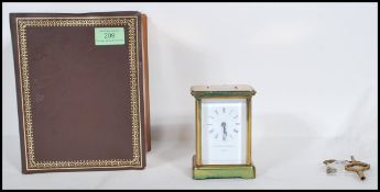 A 20th Century Matthew Norman of London brass carriage clock, with Roman numerals and key wind