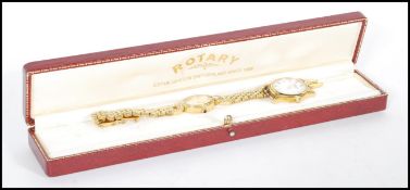 A vintage Rotary Quartz Veneto cocktail watch having a yellow metal bracelet with oval face