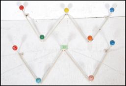 A pair of vintage retro mid 20th Century sputnik atomic space age set sof coat hooks of W zig zag