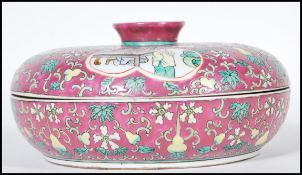 A early 20th Century 1920's Chinese lidded crudite having dark red enamelled ground with floral