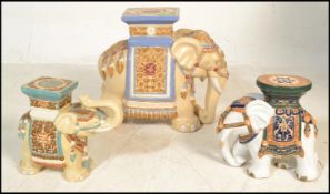A 20th century Ceramic Plant Stand / stool in the form of an Asian / Indian Elephant together with